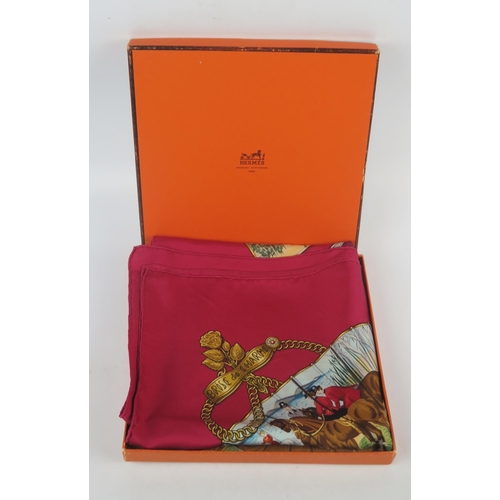 1072A - Hermes, Paris, a printed silk scarf 'Brise de Charme' pattern : 85 x 90cm. in original orange Hermes... 