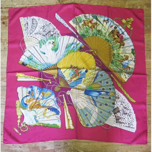 1072A - Hermes, Paris, a printed silk scarf 'Brise de Charme' pattern : 85 x 90cm. in original orange Hermes... 