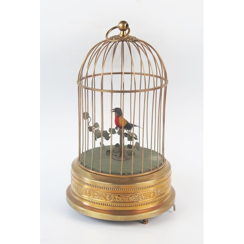 1080 - A 20th century birdcage automaton, the singing bird with moving head and beak, the cage of domed out... 