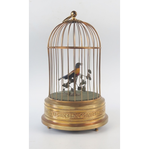 1080 - A 20th century birdcage automaton, the singing bird with moving head and beak, the cage of domed out... 