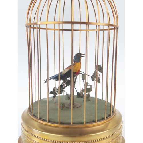 1080 - A 20th century birdcage automaton, the singing bird with moving head and beak, the cage of domed out... 