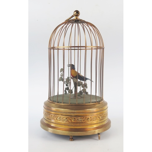 1080 - A 20th century birdcage automaton, the singing bird with moving head and beak, the cage of domed out... 