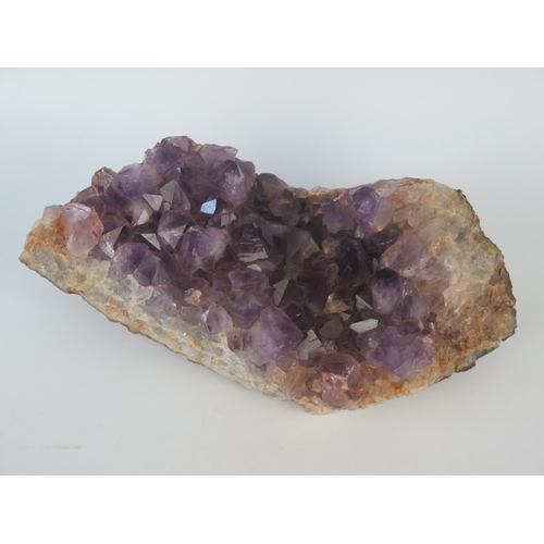 1082 - A section of an amethyst geode, 28cm long.