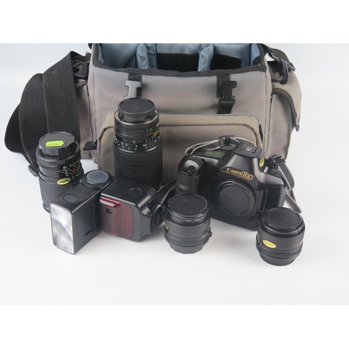 1094 - A Canon T90 35mm SLR camera, together with Canon 28mm 1:28 lens, Canon 50mm 1:14 lens, Ozeck II 1:3.... 