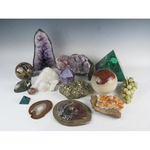 1098 - A collection of assorted geological specimens, including a malachite panelled pyramid, an amethyst g... 