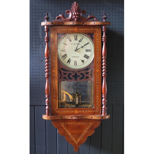 1107 - W Morris, Cardiff, a late Victorian mahogany and parquetry inlaid wall clock, with floral and scroll... 