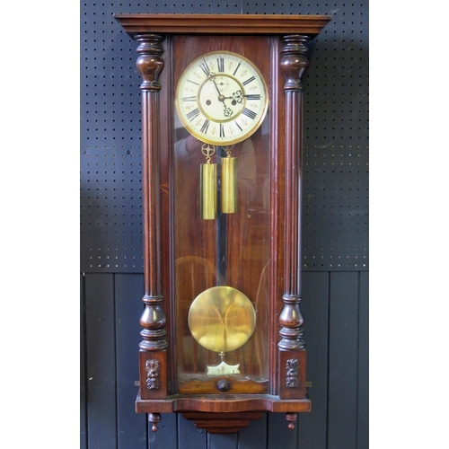 1120 - A late 19th century mahogany cased Vienna style regulator wall clock, of traditional design, the 18.... 