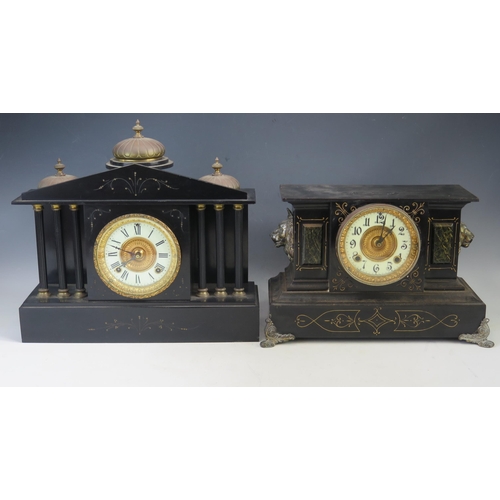 1121 - A late Victorian polished slate mantel clock of architectural outline, with three domes, to the pedi... 