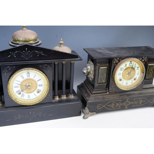 1121 - A late Victorian polished slate mantel clock of architectural outline, with three domes, to the pedi... 