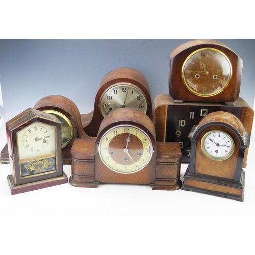 1123 - Seven assorted mantel clocks and clock cases, most of arched outline all incomplete and in need of a... 