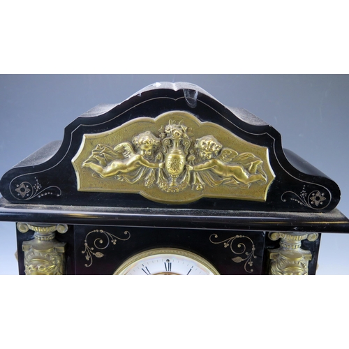 1125 - A large late Victorian polished slate mantel clock of arched outline, with applied gilt metal female... 