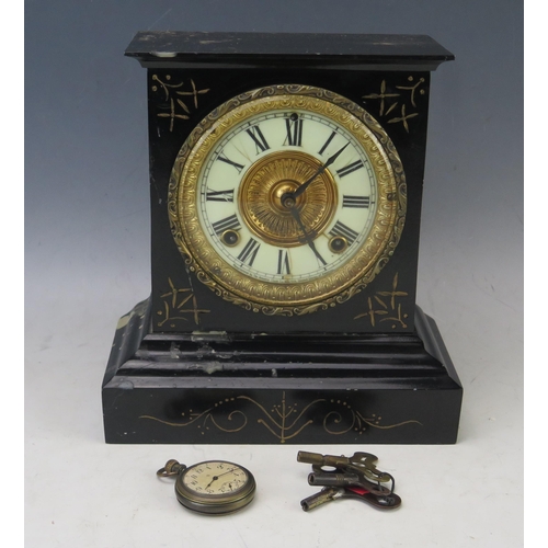 1131 - A simulated polished slate metal cased mantel  with 11cm Roman dial, the movement striking to a gong... 