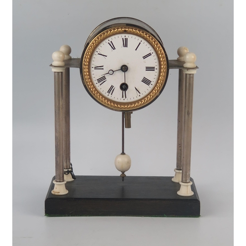 1137 - An Art Deco period chrome and faux ivory mantel timepiece, with 8cm Roman dial, raised on four plain... 