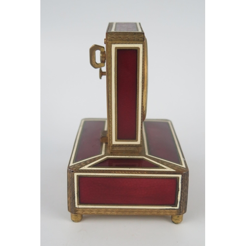 1138 - Angelus, a gilt metal and enamel eight-day musical alarm clock, with 4.5cm Roman dial, the square ca... 