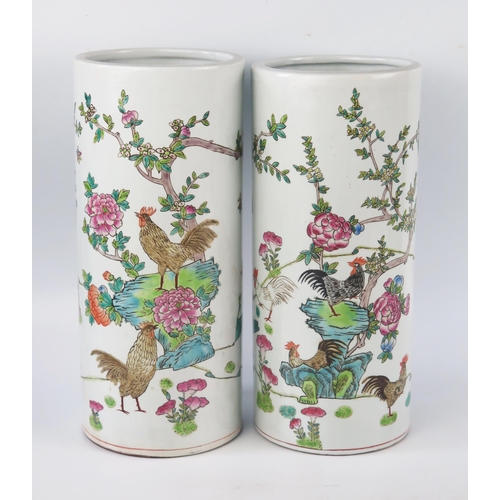 1155 - A pair of Chinese famille verte sleeve vases, painted with cockerels amongst chrysanthemums 29.5cm h... 