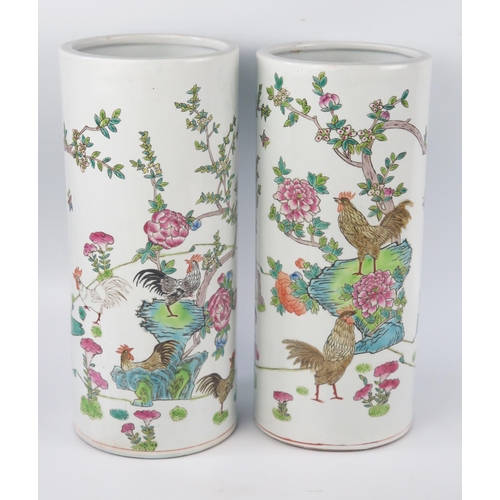 1155 - A pair of Chinese famille verte sleeve vases, painted with cockerels amongst chrysanthemums 29.5cm h... 