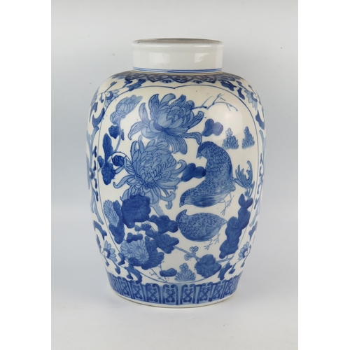 1157 - A Chinese blue and white ovoid vase and cover, with panels decorated with partridge amongst flowerin... 