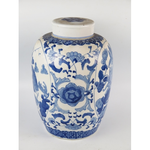 1157 - A Chinese blue and white ovoid vase and cover, with panels decorated with partridge amongst flowerin... 