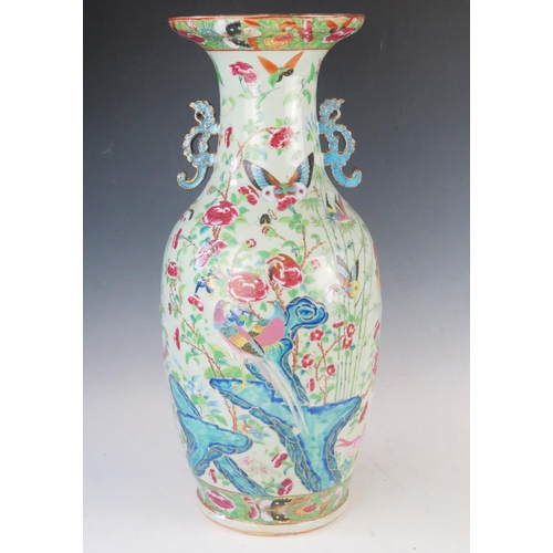 1170A - Large Chinese Famille Rose Vase, the central decoration depicts figures collecting butterflies and i... 