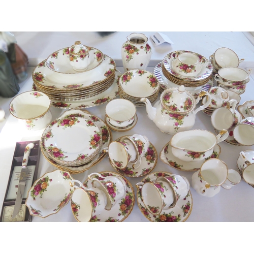 1249 - An extensive collection of Royal Albert 'Old Country Roses' pattern tea and dinner wares, vase cake ... 