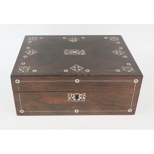 1301 - A 19th century rosewood and mother-of-pearl inlaid box, 30cm wide.