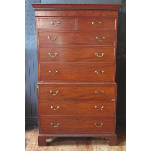 1306 - Georgian mahogany chest on chest, with dentil moulded cornice above two short and three long drawers... 