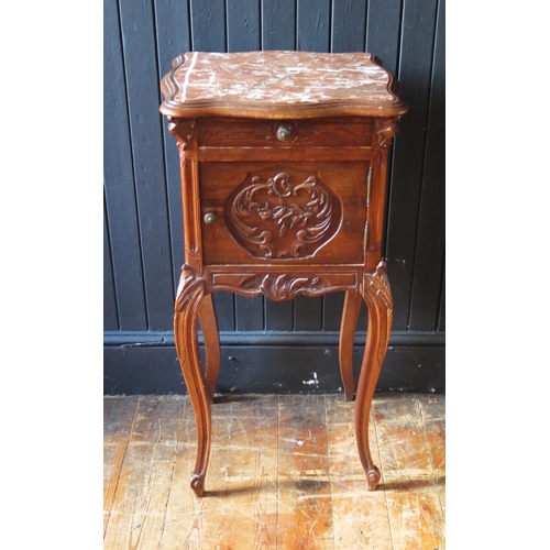 1317 - A French walnut bedside cabinet, of serpentine outline, with inset  marble top, with single short dr... 