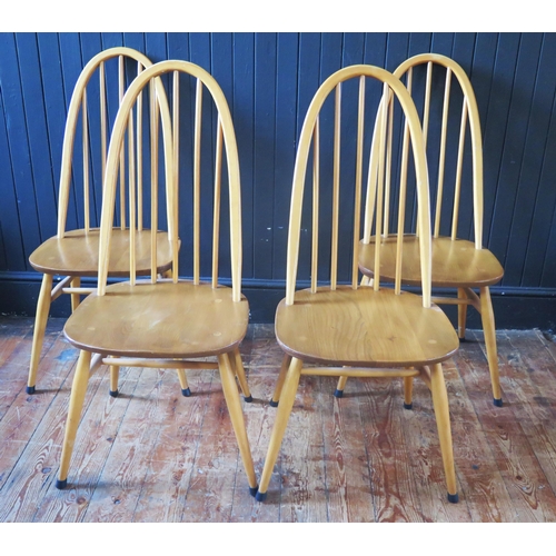 1326 - A set of four blonde Quaker style dining chairs, with arched spindle backs, solid seats on tapering ... 