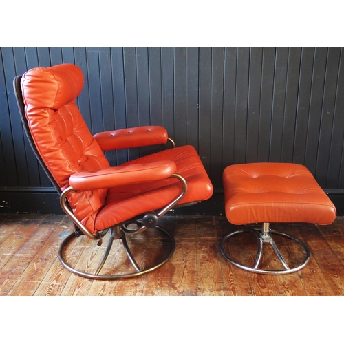 1329 - An early Ekornes 'Stressless' tan leather upholstered swivel armchair, with adjustable seat, on an a... 