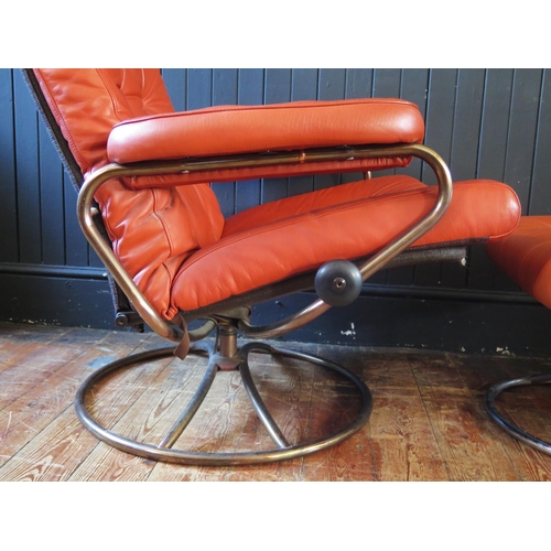 1329 - An early Ekornes 'Stressless' tan leather upholstered swivel armchair, with adjustable seat, on an a... 