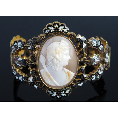 152 - An Antique Shell Cameo Bracelet decorated with a classical female bust and in a gilt and enamel sett... 