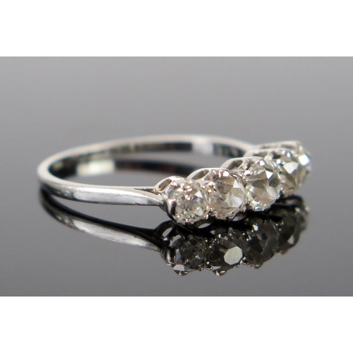 164 - A Platinum and Diamond Five Stone Ring, the old cuts roughly estimated at 1.16ct, size Q, 3g