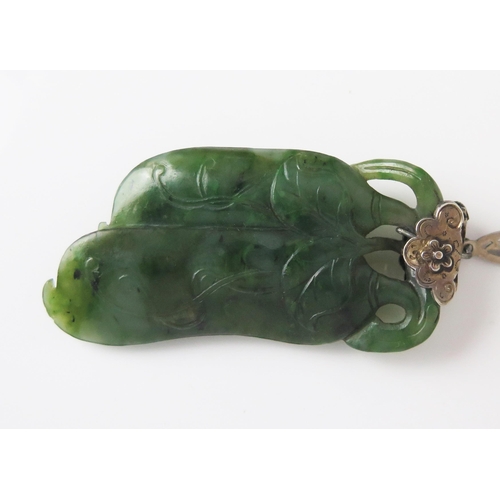 199 - A Chinese Jadeite and Silver Pendant and Chain,  carved as two aubergines / eggplants, on a lozenge ... 