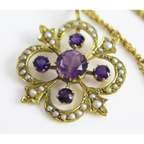 22 - An Amethyst and untested Pearl Pendant in an unmarked high carat gold setting and on a 15.5