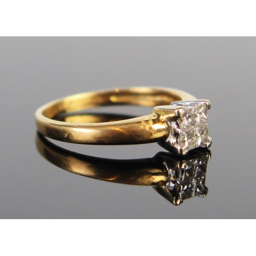 284 - An 18ct Gold and Diamond Four Stone Ring, the four princess cut stones arranged in a c, 5mm square h... 