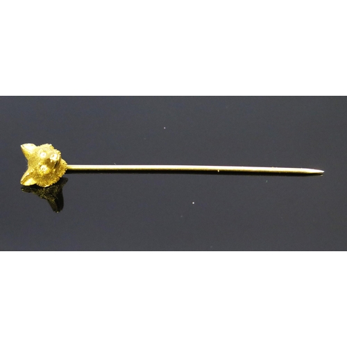 294 - An Unmarked 15ct Gold Fox Head Pin with rose cut diamond eyes, 66mm long, 2.6g