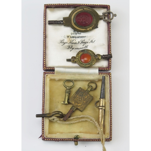 449 - A 19th Century Gilt Watch Key Fob with red stone matrix decorated with the bust of a young man in pr... 