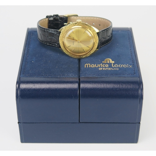 464 - A Maurice Lacroix 18ct Gold Gent's Wristwatch, 34mm diam.,  manual wind and boxed. Running