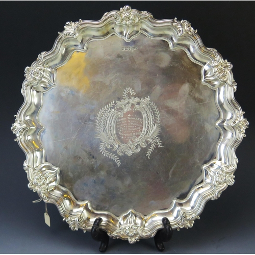 501 - A late Victorian silver salver, maker Walker and Hall, Sheffield, 1900, inscribed within central fol... 