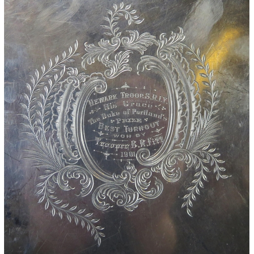 501 - A late Victorian silver salver, maker Walker and Hall, Sheffield, 1900, inscribed within central fol... 