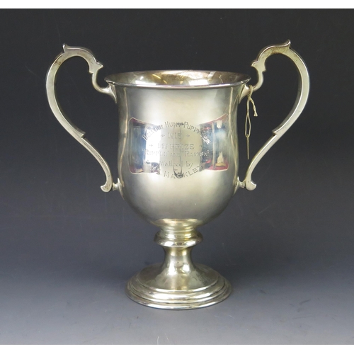 502 - A George V silver twin-handled trophy cup, maker Charles Edwards, London, 1914, inscribed, of ovoid ... 