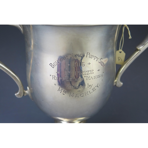 502 - A George V silver twin-handled trophy cup, maker Charles Edwards, London, 1914, inscribed, of ovoid ... 