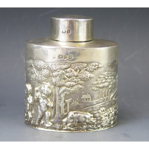 509 - A Victorian silver tea caddy and lid, maker's mark worn, Chester, 1899, of oval outline with repouss... 