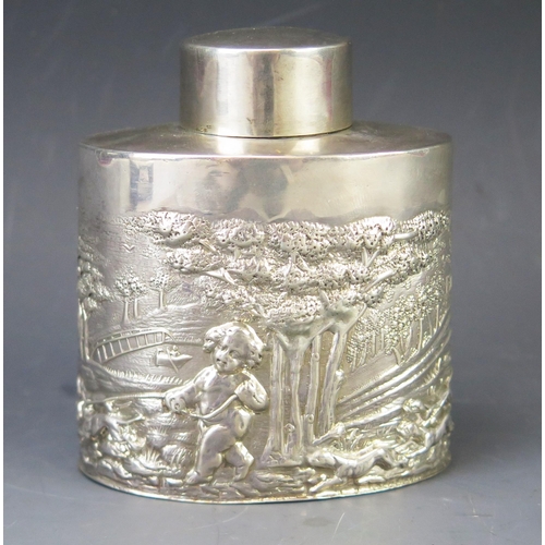 509 - A Victorian silver tea caddy and lid, maker's mark worn, Chester, 1899, of oval outline with repouss... 