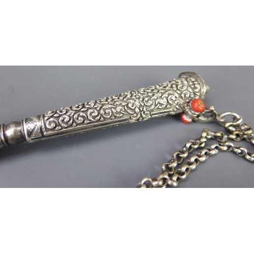 515 - An Indo-Persian white metal and niello decorated dagger, with 18.5cm single edged steel blade, with ... 