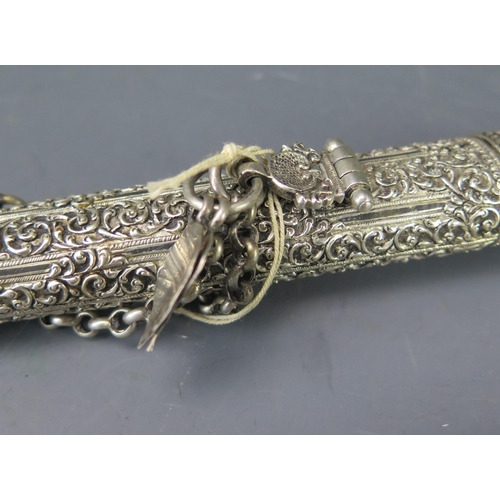 515 - An Indo-Persian white metal and niello decorated dagger, with 18.5cm single edged steel blade, with ... 