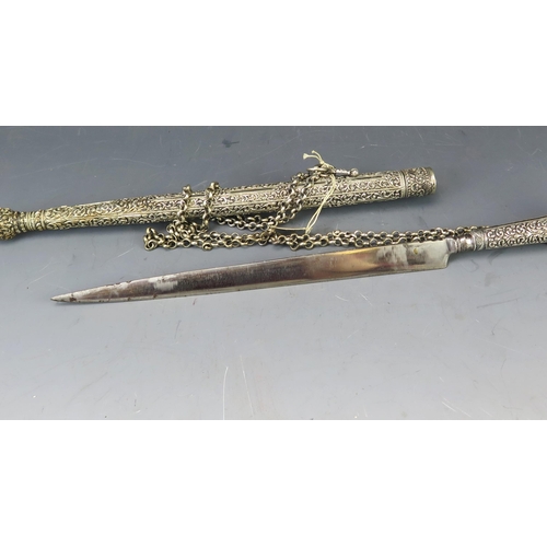 515 - An Indo-Persian white metal and niello decorated dagger, with 18.5cm single edged steel blade, with ... 