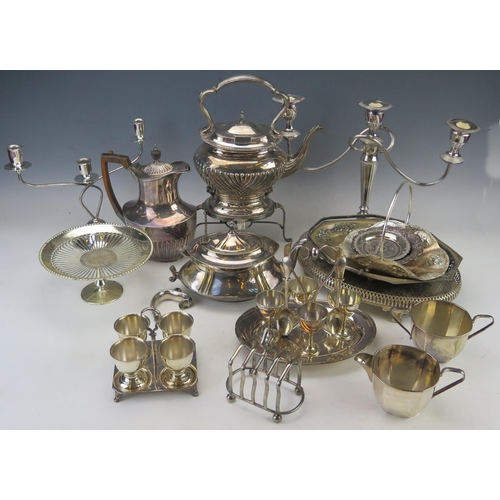 522 - A collection of assorted plated wares including, spirit kettle and stand, two twin branch candelabra... 