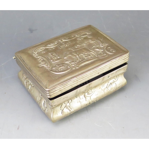 530 - A continental silver box, of rectangular outline, stamped marks, the lid and sides decorated with fi... 