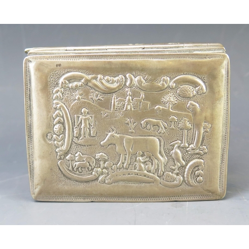 530 - A continental silver box, of rectangular outline, stamped marks, the lid and sides decorated with fi... 